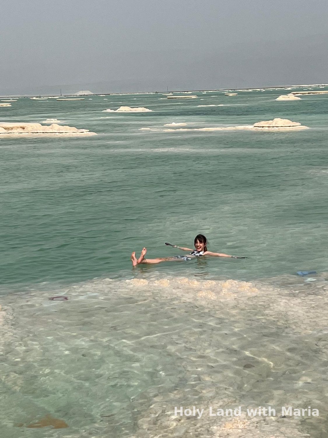 Floating in the mineral water of the Dead Sea