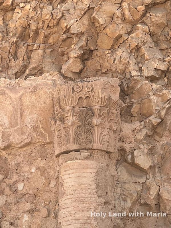 Carved stone among the desert cliffs by the Dead Sea