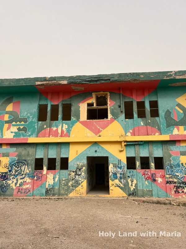 Desert graffiti on an abandoned building by the Dead Sea