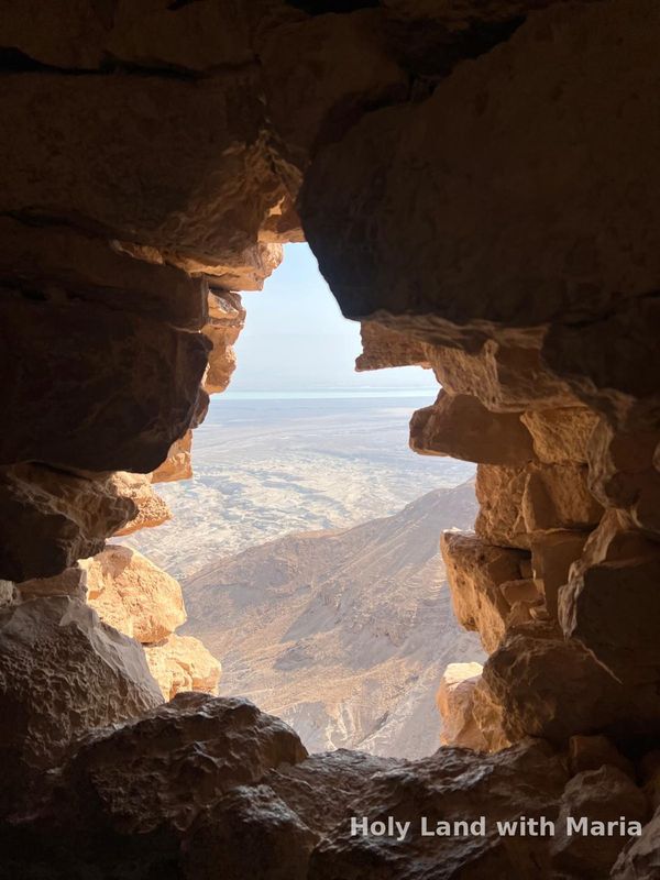 The Judean desert seen through a rock window above the Dead Sea
