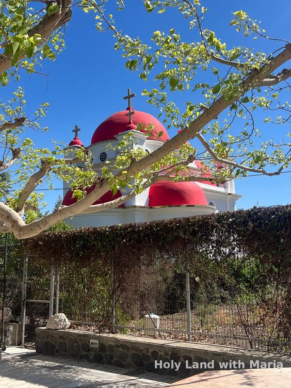The red-domed Greek Orthodox church at Capernaum